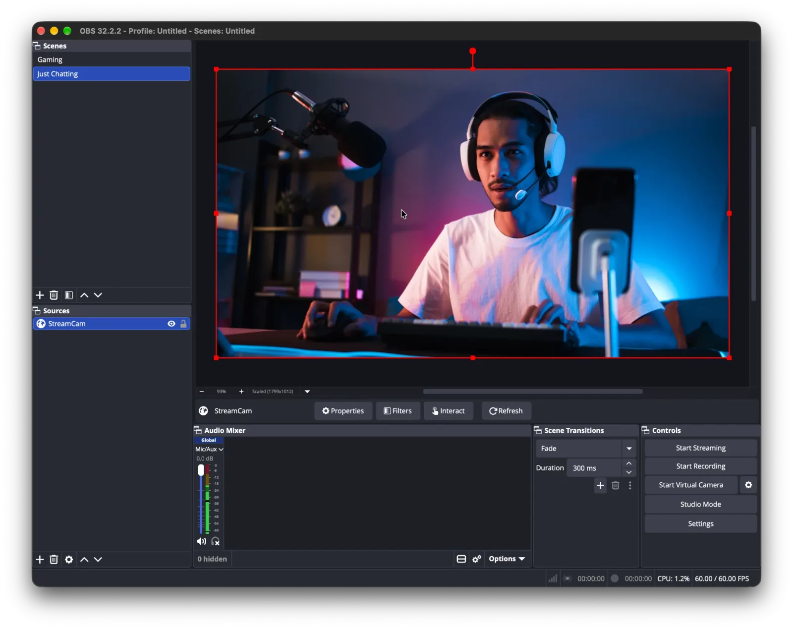 OBS on a Mac with a Just Chatting scene: the StreamCam Browser Source fills the canvas with a streamer at their desk